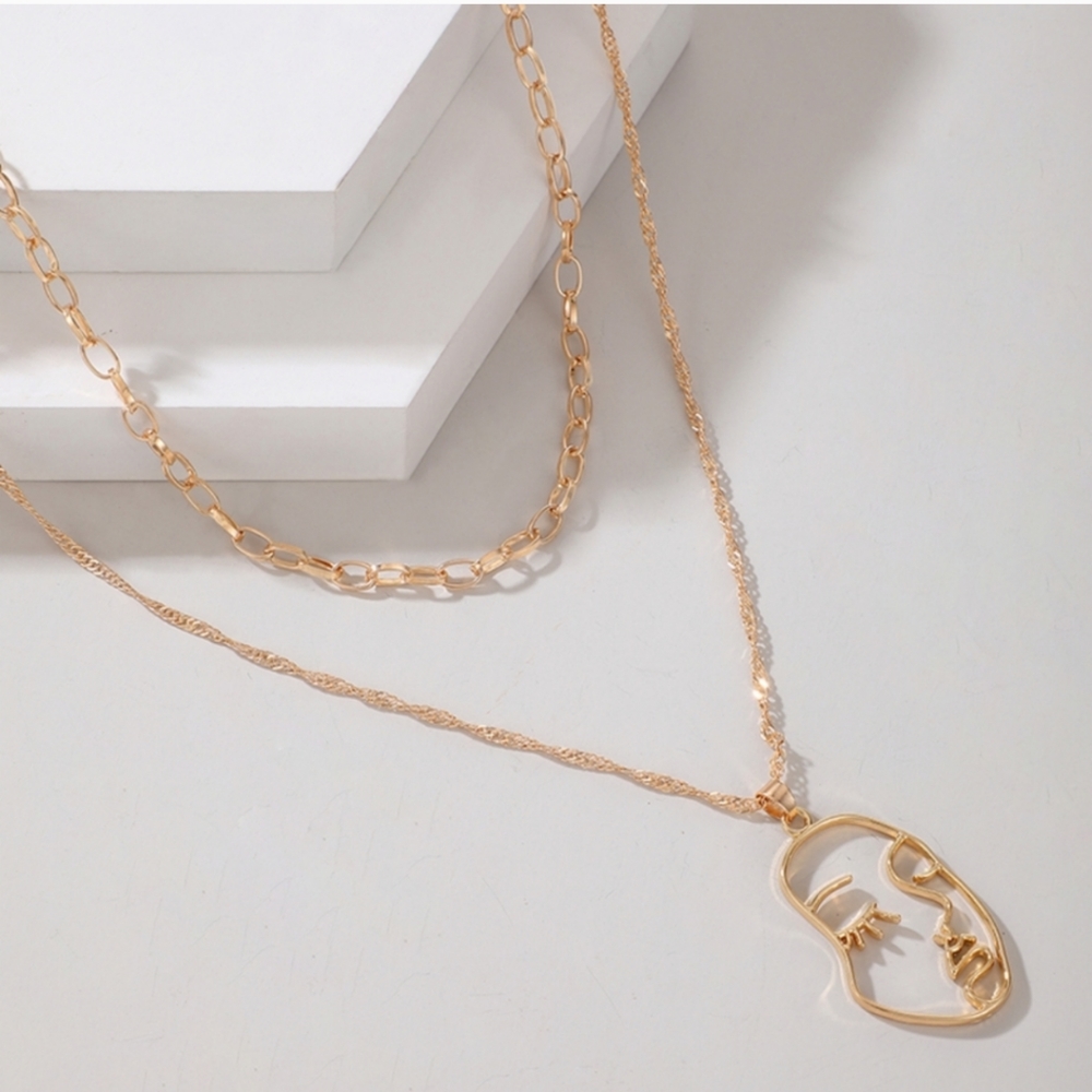 Beyond.Her necklace